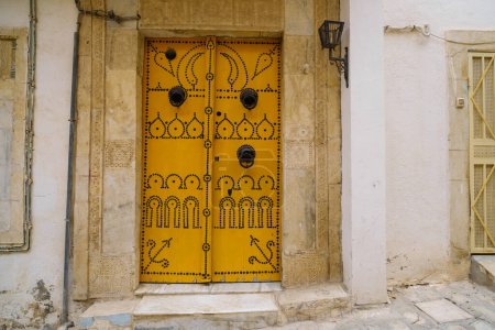 Photo for Image of old door in Tunisia. Arabic style architecture. - Royalty Free Image