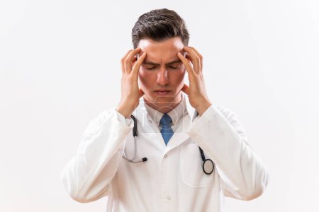 Téléchargez les photos : Image d'un médecin fatigué ayant mal à la tête. - en image libre de droit
