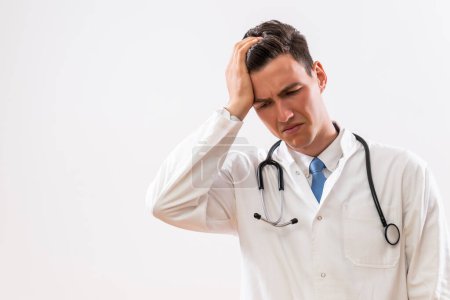 Photo for Image of tired and worried doctor. - Royalty Free Image