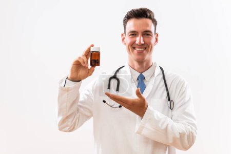 Foto de Imagen del médico mostrando frasco de pastillas . - Imagen libre de derechos