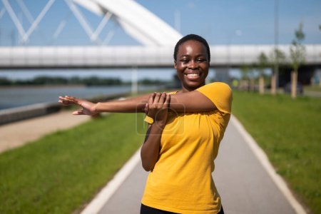 Photo for Young woman enjoys  exercising outdoor. - Royalty Free Image