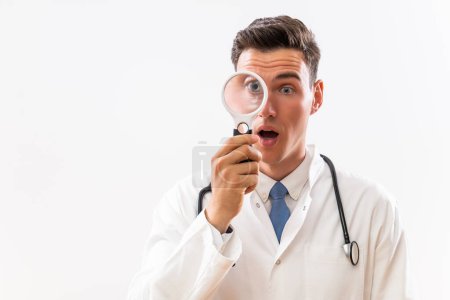 Photo for Image of shocked  doctor with loupe. - Royalty Free Image