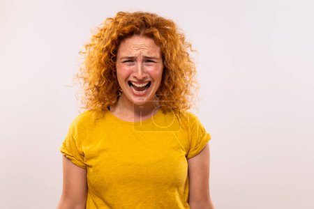 Photo for Image of angry ginger woman screaming. - Royalty Free Image