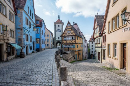 Polnlein in historic old town of Rothenburg ob der Tauber, Germany. Old historic houses and gate towers.