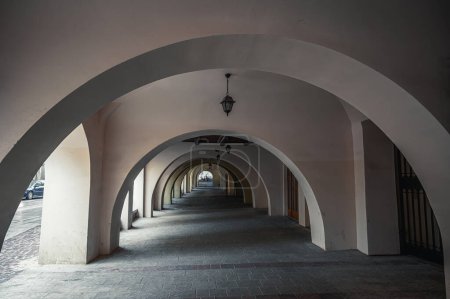 Photo for Arch passage, arched corridor street in Krakow, Poland - Royalty Free Image