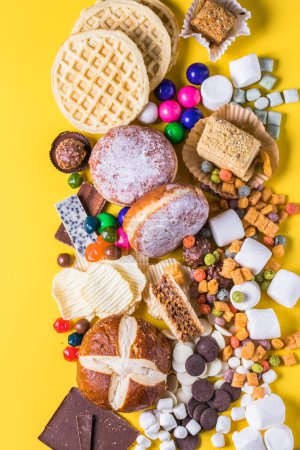 Photo for Assortment of Unhealthy Food, top view, copy space. Unhealthy eating, junk food concept. - Royalty Free Image