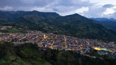 Aerial Night View of a Vibrant Mountain Town. Jardin, Antioquia, Colombia
