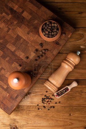 Photo for Wood pepper mill. Wooden grinder for salt or pepper. - Royalty Free Image