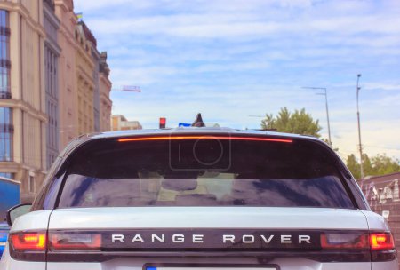 Photo for Kyiv, Ukraine May 1, 2021 rear window of the car SUV Range Rover. Luxury expensive premium car visa from behind. Traveling by car on the road. Automobile production. Drive Land Rover in urban space. - Royalty Free Image