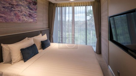 Photo for Luxury bedroom in a new build condo apartment in Phuket Thailand November 2022 - Royalty Free Image