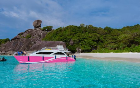 Photo for Tourist boat and Turqouse colored ocean and white beach at the tropical Island Similan Island Thailand. - Royalty Free Image