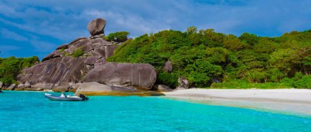 Photo for Turqouse colored ocean and white beach at the tropical Island Similan Island Thailand on a sunny day with a empty beach - Royalty Free Image