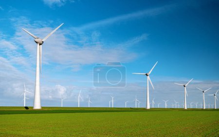 Photo for Drone Aerial view at Windmill park with windmills turbines in the ocean - Royalty Free Image