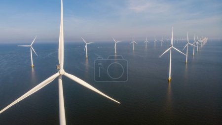 Photo for Windmill park with windmills turbines in the Netherlands on a summer day - Royalty Free Image