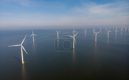 Photo for Drone view from above at Windmill park with windmills turbines in the Netherlands - Royalty Free Image