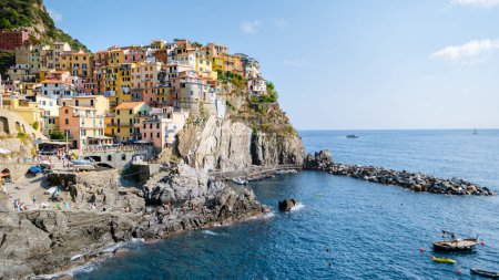 Photo for Manarola Village Cinque Terre Coast Italy. colorful town in Liguria one of five Cinque Terre. Manarola traditional Italian village in the National park Cinque Terre, with multicolored houses on rock - Royalty Free Image