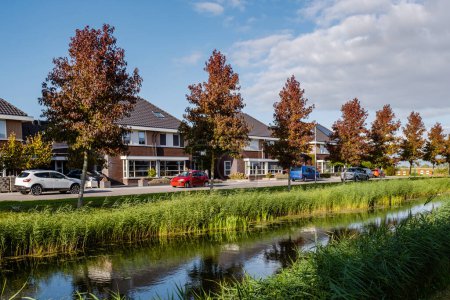 Photo for Suburban area with modern family houses, newly build modern family homes in the Netherlands, dutch family house - Royalty Free Image