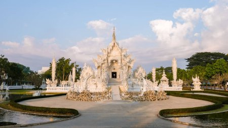 Photo for White temple Chiang Rai Thailand during sunset, Wat Rong Khun, aka The White Temple, in Chiang Rai, Thailand. - Royalty Free Image