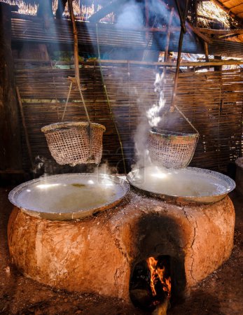 Téléchargez les photos : Salt pans at Nan Thailand, mountains of Sapan valley in Thailand with rice fields and forest. salt pans in Sapan Nan Bo Klue. - en image libre de droit