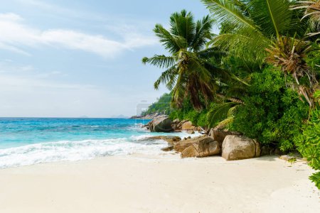 Photo for Petite Anse beach Mahe Tropical Seychelles Islands on a sunny day. - Royalty Free Image