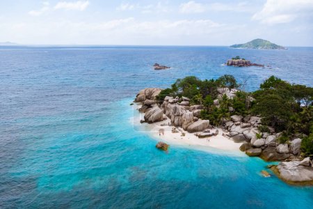 Téléchargez les photos : Drone view from above at a tropical beach in the Seychelles Cocos Island. - en image libre de droit