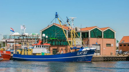 Foto de Urk Flevoland Netherlands May 2017 fishing harbor of Urk Holland with fishing boats Fishing village Urk. - Imagen libre de derechos