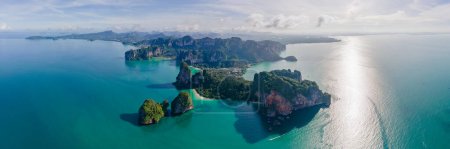 Photo for Railay Beach Krabi Thailand, the tropical beach of Railay Krabi, drone view from above, Panoramic view of idyllic Railay Beach in Thailand with a traditional long boat. panorama - Royalty Free Image