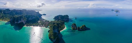 Photo for Railay Beach Krabi Thailand, the tropical beach of Railay Krabi, drone view from above, Panoramic view of idyllic Railay Beach in Thailand with a traditional long boat. panorama - Royalty Free Image