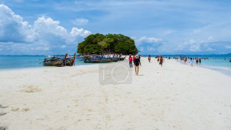 Photo for Tup Island Krabi Thailand July 2022, the tropical beach of Tup Island Krabi with longtail boats and tourists on the beach. - Royalty Free Image