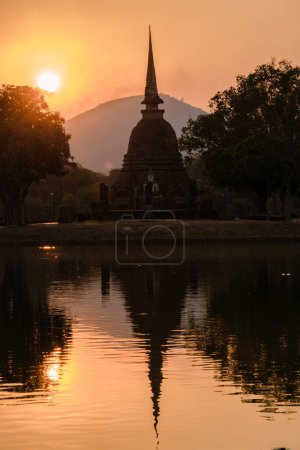 Photo for Wat Sa Si at sunset Sukhothai old city, Thailand. Ancient city and culture of south Asia Thailand, Sukothai historical park at sunset - Royalty Free Image
