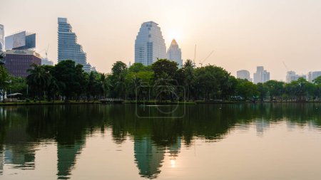 Photo for Lumpini park Bangkok Thailand with an air-polluted sky pm 2,5 smog. - Royalty Free Image
