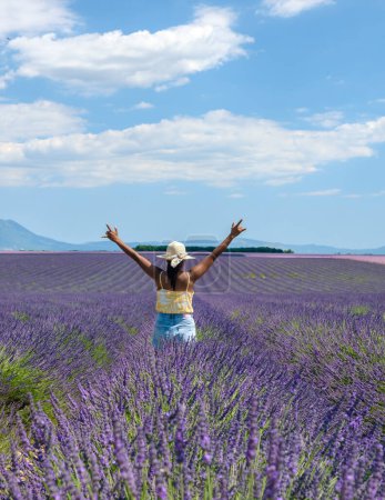 Photo for Provence, Lavender field France, Valensole Plateau, a colorful field of Lavender Valensole Plateau, Provence, Southern France Asian women on vacation in france - Royalty Free Image