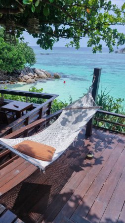 Photo for Hammock at the beach of Koh Lipe Island Southern Thailand with turqouse colored ocean and white sandy beach at Ko Lipe. - Royalty Free Image