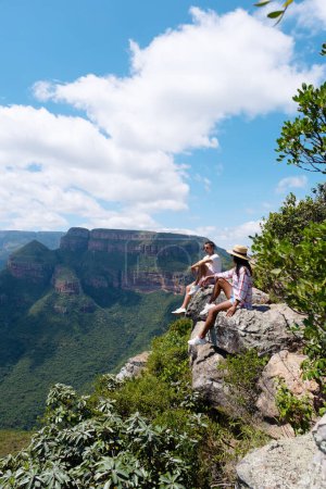 Photo for Panorama Route South Africa, Blyde river canyon with the three rondavels, view of three rondavels and the Asian women and Caucasian men on vacation in South Africa - Royalty Free Image