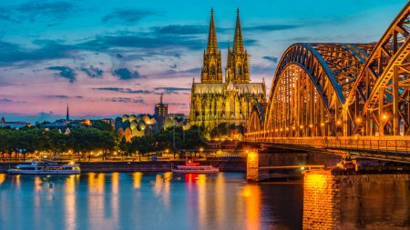 Cologne Koln Germany during sunset, Cologne bridge with the cathedral. beautiful sunset at the Rhine river