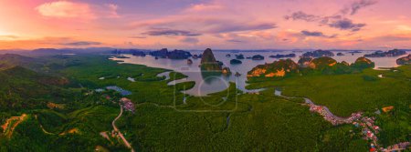 Photo for Panorama view of Sametnangshe, view of mountains in Phangnga bay with mangrove forest in andaman sea with evening twilight sky, travel destination in Phangnga, Thailand - Royalty Free Image