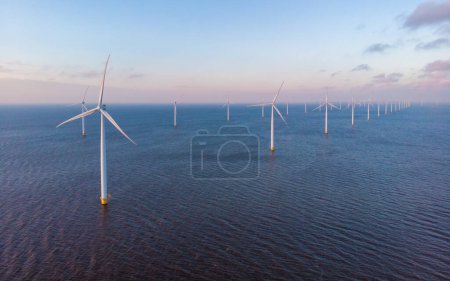 Photo for Aerial photo of wind turbines at sunset - Royalty Free Image