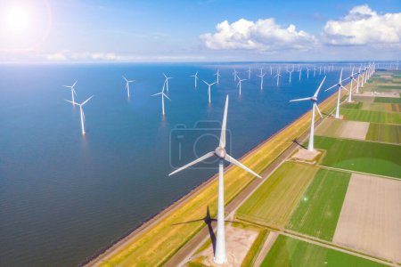 Foto de Energía electricidad energía eólica medio ambiente océano eco molino de viento energía renovable turbina - Imagen libre de derechos
