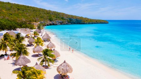Photo for Cas Abao Beach Playa Cas Abao Caribbean island of Curacao, Playa Cas Abao in Curacao Caribbean tropical white beach with a blue turqouse colored ocean. Drone aerial view at the beach summer holiday - Royalty Free Image