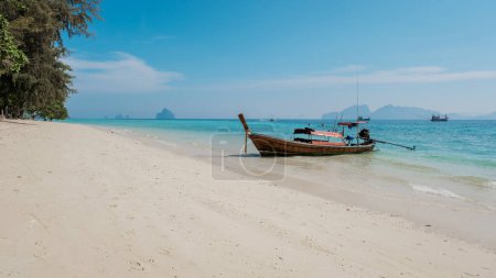Photo for Longtail boats at the beach of Koh Kradan island in Thailand, aerial view over Koh Kradan Island Trang voted in 2023 as the nr 1 beach in the world - Royalty Free Image