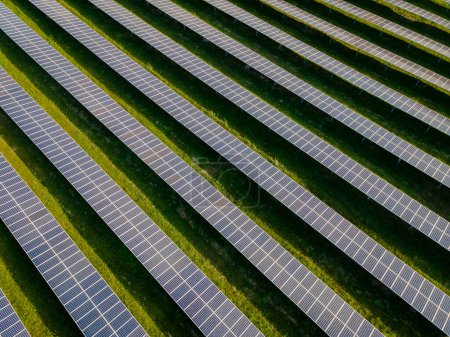Photo for Sun power solar panel fields in Thailand in the evening light, Solar panel systems power electric generators from the sun. Energy Transition in Chonburi Thailand - Royalty Free Image