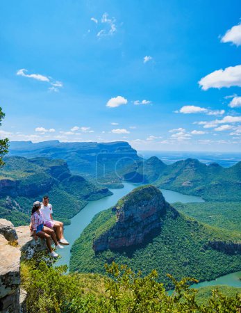 Photo for Panorama Route South Africa, Blyde river canyon with the three rondavels, view of three rondavels and the Blyde river canyon in South Africa. Asian women and Caucasian men on vacation in South Africa - Royalty Free Image
