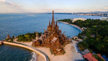 Photo for View from above at The Sanctuary of Truth wooden temple in Pattaya Thailand is a gigantic wooden construction located at the cape of Naklua Pattaya City Chonburi Thailand - Royalty Free Image