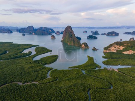 panorama view of Sametnangshe viewpoint of mountains in Phangnga Bay with mangrove forest in the Andaman Sea with evening twilight sky, travel destination in Phangnga, Thailand