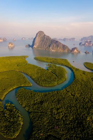 Sametnangshe viewpoint of mountains in Phangnga Bay with mangrove forest in the Andaman Sea with evening twilight sky, travel destination in Phangnga, Thailand