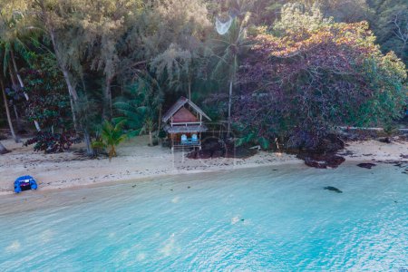 Photo for Koh Wai Island Trat Thailand is a tinny tropical Island near Koh Chang. wooden bamboo hut bungalow on the beach - Royalty Free Image
