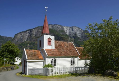 Photo for Church in Undredal, small beautiful village at Aurland fjord, Norway.  Aurlandsfjord landscape is UNESCO World Heritage Site. - Royalty Free Image