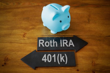 A Piggy bank and arrows with signs Roth IRA and 401k retirement plan.