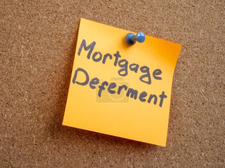 Photo for Sticker with the inscription mortgage deferment is pinned to the board. - Royalty Free Image