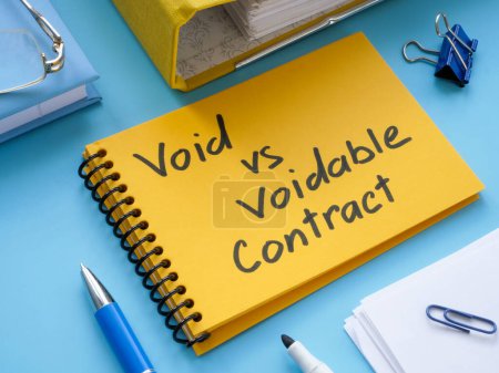 Photo for Notepad with inscription void vs voidable contract. - Royalty Free Image